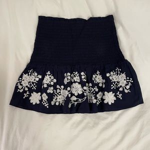 Navy skirt with white embroidery